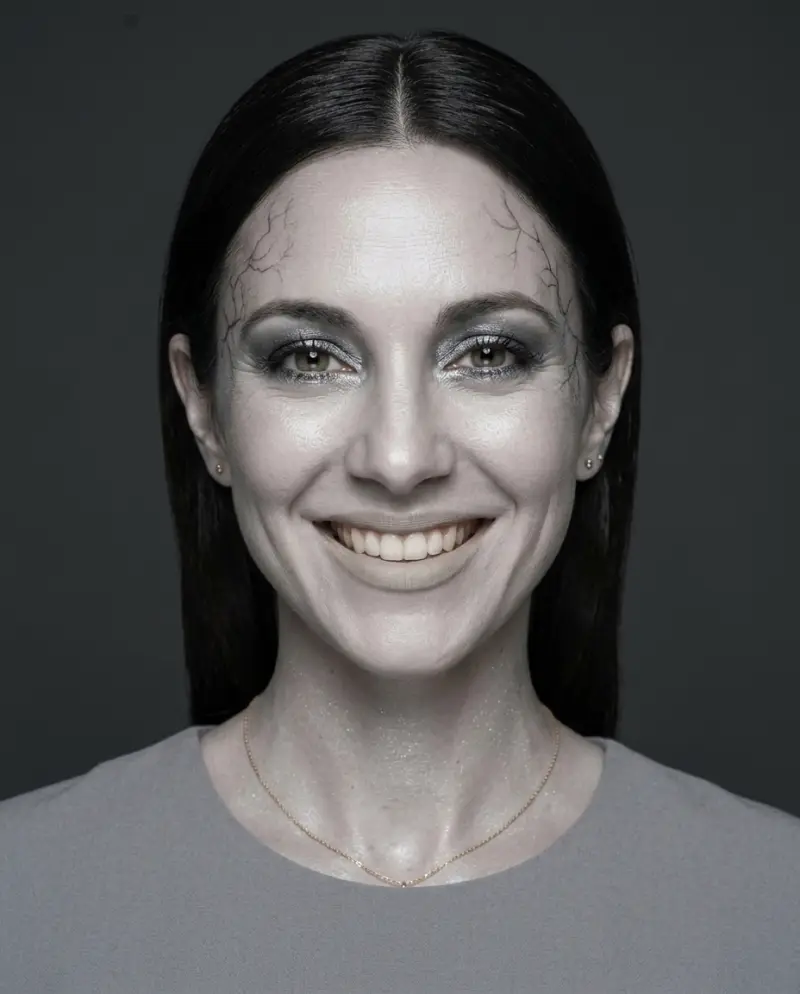 AI-made adult model with a glam grey zombie makeup look in studio light